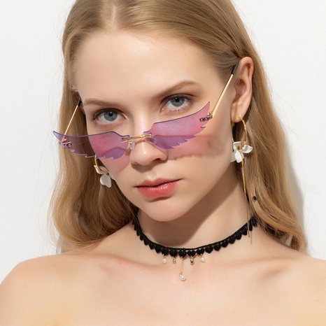 Nouveau style De Mode Coloré Ailes forme Sans Monture lunettes de Soleil en métal's discount tags