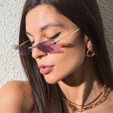 New style Fashion Dragonfly Wings Rimless Metal Sunglasses's discount tags