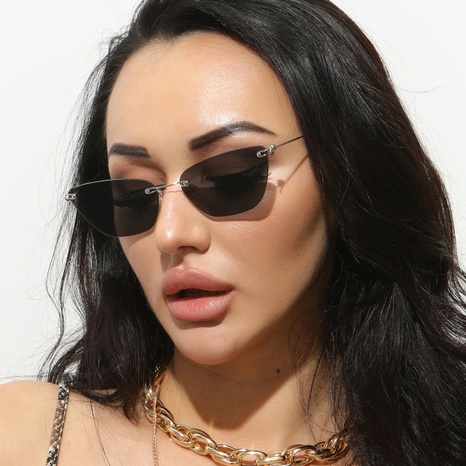 Fashion style Small Frame Cat Eye Frameless metal Sunglasses's discount tags