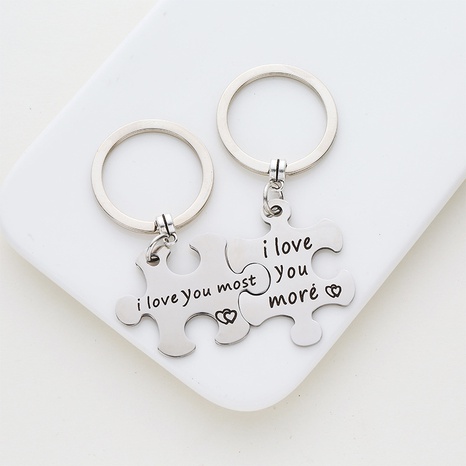 Fashion Creative Stainless Steel Puzzle Shaped Keychain Pendant's discount tags