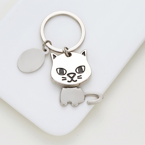 Head-Shooking Dog Creative Metal Movable Alloy Keychain Pendant's discount tags