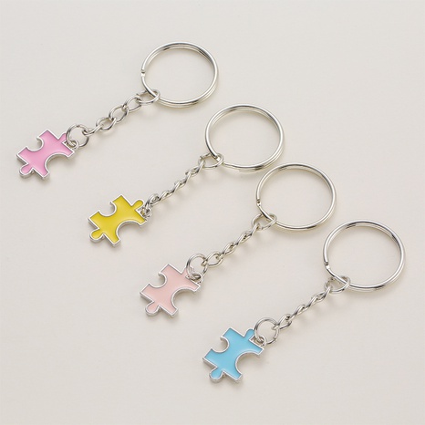 Cartoon Cute Alloy Drip Square Four-Color Puzzle Blocks Key Chain's discount tags