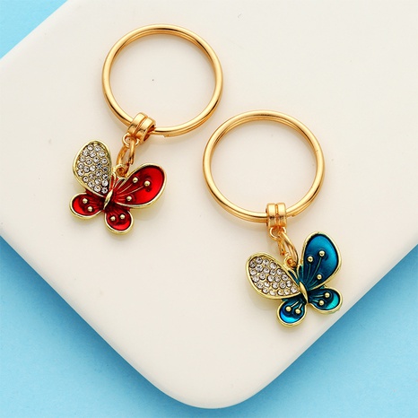 Fashion Dripping Oil Alloy Rhinestone Butterfly Pendant Keychain's discount tags