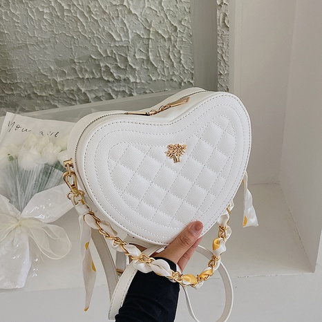 Fashion Heart-Shaped Solid Color Women's Summer 2022 Rhombus Chain Bag's discount tags