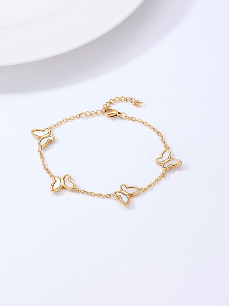 Fashion Simple Stainless Steel Electroplated 18K Gold White Butterfly Bracelet's discount tags