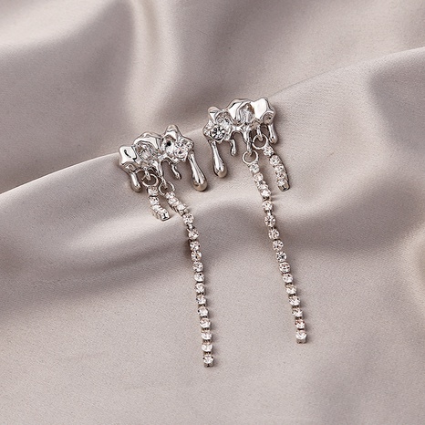 Fashion Geometric Liquid Metal Lava Water Drop Inlay Rhinestone Long Women's Earrings's discount tags