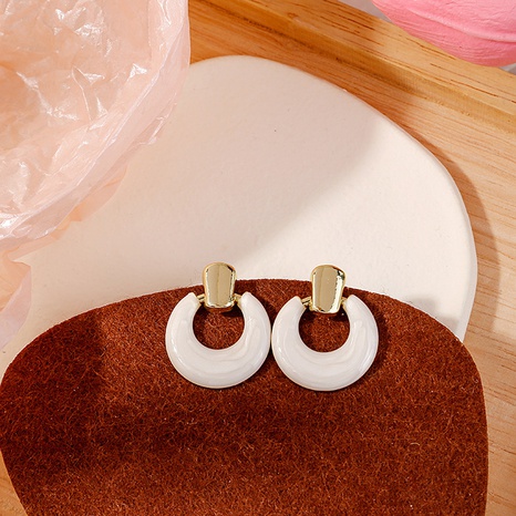 Fashion Oil Dripping Geometric White round Alloy Earrings's discount tags