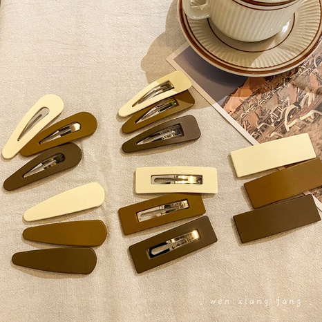 Conjunto de pinzas de pelo de tres piezas de plástico de color sólido de moda simple's discount tags