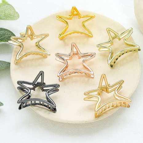 Moda estrella de mar en forma de Metal bonito agarre de aleación Color sólido accesorios para el cabello's discount tags