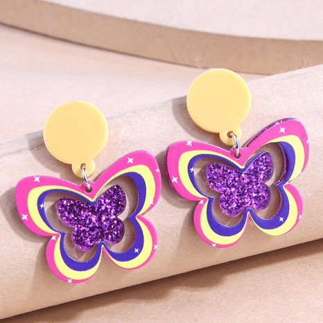 Nuevos bonitos pendientes de plástico con forma de mariposa púrpura's discount tags