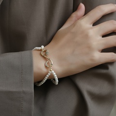 Nouveau mode d'or serpent forme double couche de cuivre perle incrusté zircon Bracelet