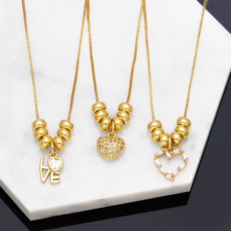 Collar de cobre de circonio con forma de corazón con letras de amor incrustadas en diamantes para mujer con cuentas redondas a la moda's discount tags