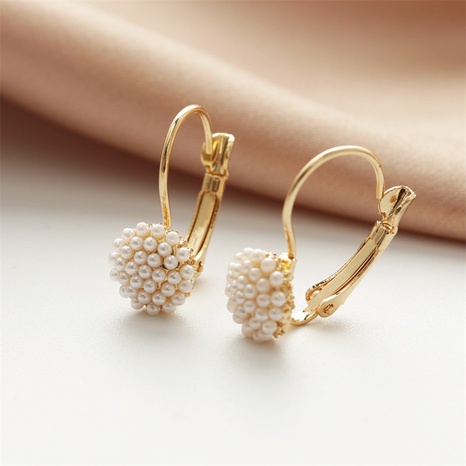 Mode Ornament Elegante Perle Intarsien Ohr Clip Großhandel's discount tags