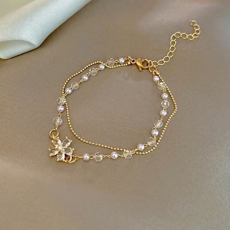 Fashion Simple Flower Shaped Transparent Beaded Pendant Bracelet's discount tags