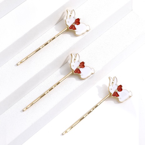 2022 New Cute White Red Little Bunny Side Clip Hairpin Hair Accessory's discount tags