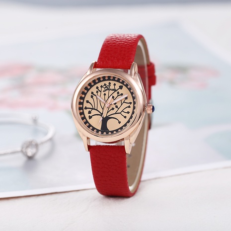 Reloj de cuarzo para mujer de aleación con patrón de árbol y correa de cuero de PU de color sólido a la moda's discount tags