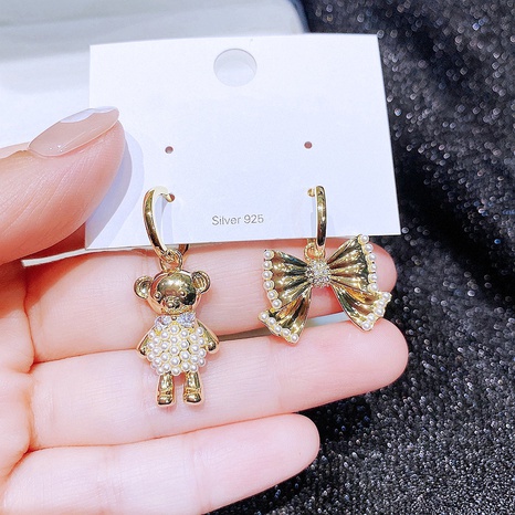 Fashion Zircon Inlaid Small Rice-Shaped Beads Cute Bear Bow Ear Clip Earrings Wholesale's discount tags