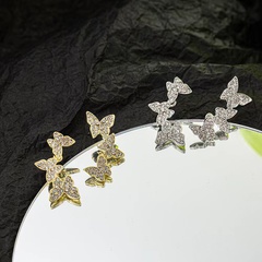 Mode Neue Metall Asymmetrische Voller Diamanten Schmetterling Retro Stud Ohrringe