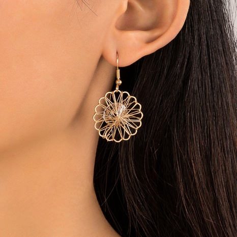 Fashion New Simple Creative Hollow  Geometric Flower Pendant Women Wholesale Alloy Earring's discount tags