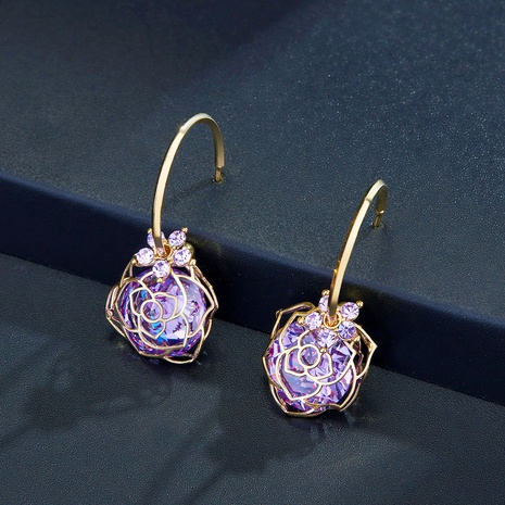 Nuevos pendientes de circonio de cristal púrpura chapado en oro de cobre's discount tags