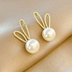 Nuevo estilo Simple geométrico conejo perla cobre pendientes