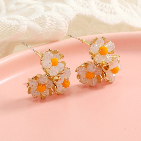Fashion New Sweet Retro Simple Hand-Woven Small Fresh Flower Alloy Earrings's discount tags