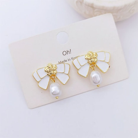 Fashion White Bow Pearl Alloy Earrings's discount tags