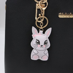 LLavero de accesorios de bolso colgante de cuero de conejo de dibujos animados de estilo lindo
