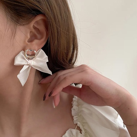 Sweet Geometric Bow Knot Cloth Earrings's discount tags