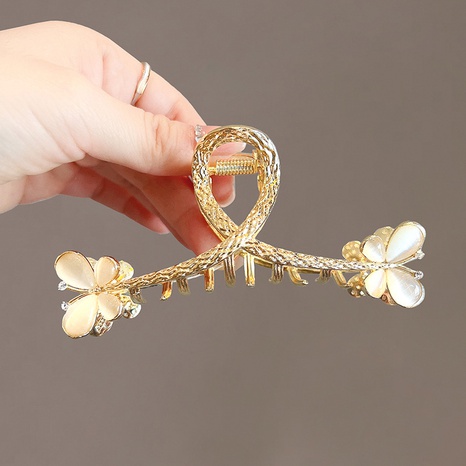 Women'S Fashion Geometric Butterfly Alloy Headwear Plating Artificial Rhinestones Hair Claws's discount tags