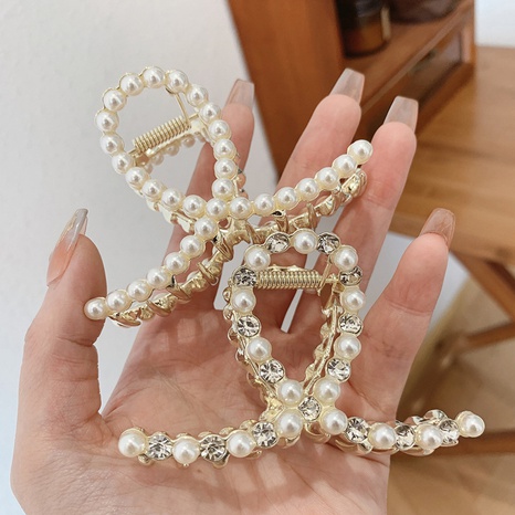 Mujeres Moda Estilo Clásico Geométrico Aleación Sombreros Enchapado Diamantes De Imitación Artificiales Perla Artificial Garras De Pelo's discount tags