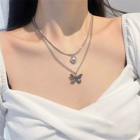 Simple moda doble plateado-Collar de diamantes de imitación con incrustaciones de aleación de corazón de mariposa colgante en capas's discount tags