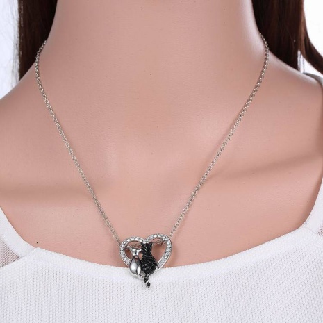 Fashion Ornament Black and White Cat Heart Shaped Pendant Alloy Necklace's discount tags