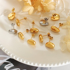 Retro geométrico gota de agua forma femenina titanio acero 18K chapado en oro pendiente ornamento
