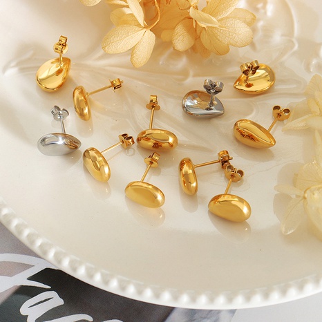 Retro geométrico gota de agua forma femenina titanio acero 18K chapado en oro pendiente ornamento's discount tags