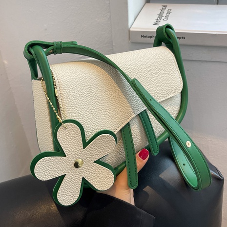 Fashion Solid Color Flower Pillow Shape Magnetic Buckle Shoulder Bag Saddle Bag's discount tags