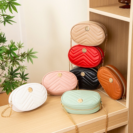 Fashion Solid Color Embossing Oval Zipper Crossbody Bag's discount tags