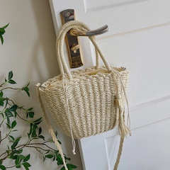 simple tassel drawstring medium size woven straw portable crossbody Bag