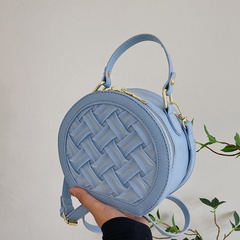 2022 New style solid color woven Portable Messenger Small round Bag