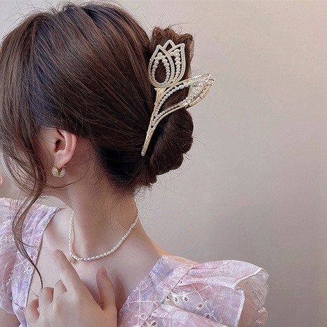 Pinza de pelo de verano con diamantes de imitación de perlas incrustadas en forma de tulipán de moda's discount tags