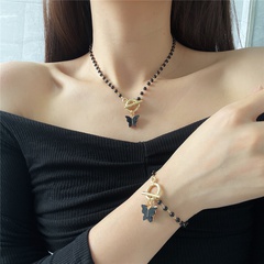 Einfache Schwarz Perle OT Schnalle Schmetterling Anhänger Halskette Armband