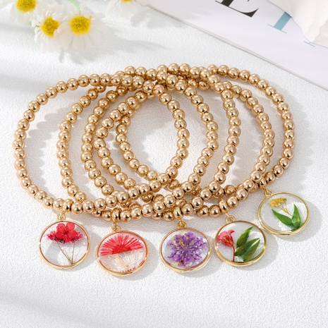 Women'S Simple Style Flowers Alloy Plastic Bracelets Beaded Inlaid Resin Bracelets & Bangles's discount tags