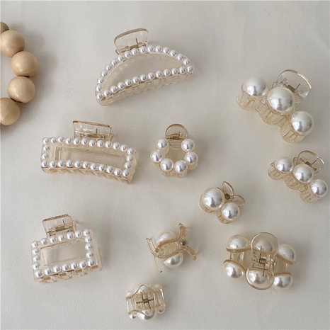 Sweet Geometric Arylic Inlay Pearl Hair Claws's discount tags