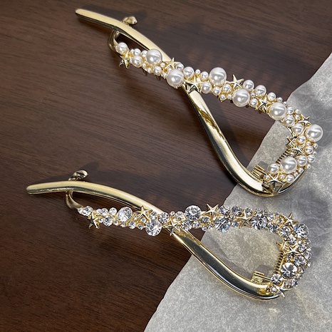 Moda Estrella Metal Enchapado Embutido Diamante De Imitación Perla Pinza Para El Cabello's discount tags