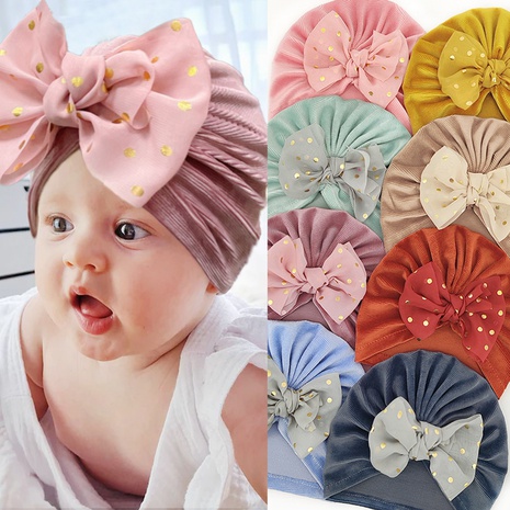 Children Unisex Cute Solid Color Bow Knot Baby Hat's discount tags