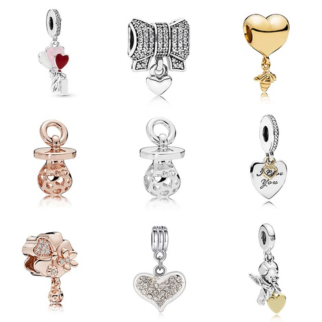 Amour Coeur Fleurs Arc Pendentif Alliage Électrolytique Diamant En Forme de Coeur Perle Accessoires DIY Bracelet de Femmes Accessoires's discount tags