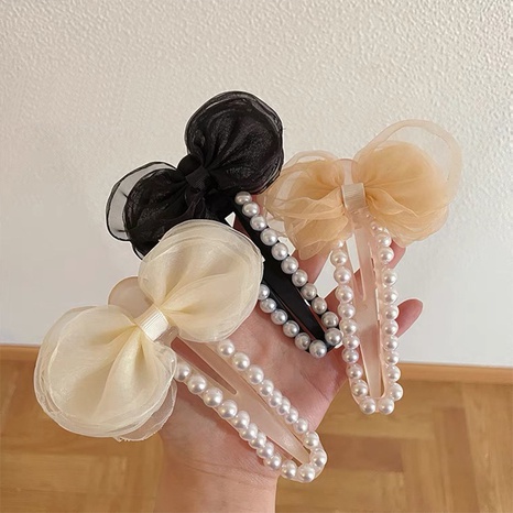 Simple Style Bow Knot Synthetic Yarn Pearl Hair Clip's discount tags