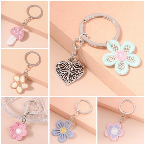 Sweet and Cute Woven Flower Mushroom Keychain's discount tags