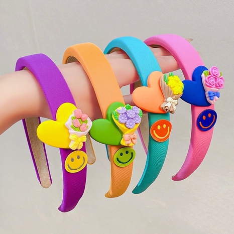 Fashion Smiley Face Bow Knot Cloth Resin Printing Hair Band's discount tags