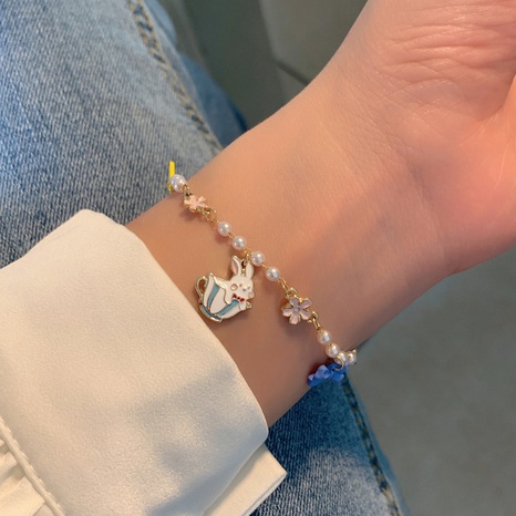 Sucré Fleur Noeud D'Arc Perle D'Imitation Alliage Émail Bracelets's discount tags